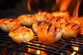 flame-kissed scallops on a backyard grill, flames visible