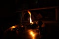 Flame light prayer devotional dark background Royalty Free Stock Photo