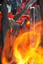Flame over burning wood close up Royalty Free Stock Photo