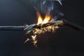 flame smoke and sparks on an electrical cable, fire hazard concept Royalty Free Stock Photo