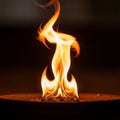 The flame is visually palpable, emphasizing its organic and spontaneou Royalty Free Stock Photo