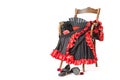 Flamenco clothing and shoes on a wooden chair