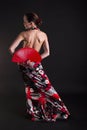 Flamenco dancer with red fan