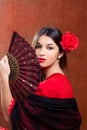 Flamenco dancer woman gipsy red rose spanish fan Royalty Free Stock Photo