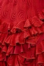 Flamenco dress outfit detail, red color. Elegant spanish woman clothing