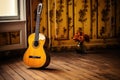 flamenco guitar resting on a wooden floor