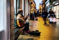 Flamenco guitarist in the streets of sevilla at night.