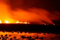The flames burn in the dry fields and straw at night, the smog problem and global warming in Southeast Asia,