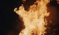 Flames Dancing in Dark Background, Captivating Fire Patterns and Textures, Abstract Fire Art Royalty Free Stock Photo