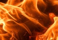 Flames dominate the image with a vibrant display of orange and Royalty Free Stock Photo