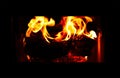 Flames And Embers Burning In Fireplace Insert Royalty Free Stock Photo
