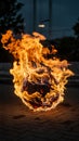 Flames engulfing a ball, creating intense and visually impactful scene Royalty Free Stock Photo