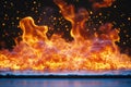 Flames erupting from a surface creating an intense fire display with glowing embers Royalty Free Stock Photo