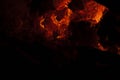 Embers burning in the fireplace with large flames Royalty Free Stock Photo