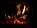 The flames of the fire in the fireplace Royalty Free Stock Photo