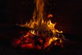 Flames in the fireplace. Burning wood. Brick fireplace Royalty Free Stock Photo