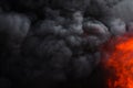 Flames strong red fire, dramatic clouds motion blur of black smoke covered sky Royalty Free Stock Photo