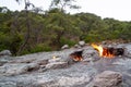 Flames from underground on Mount Chimaera in Turkey. Burning volcanic gas on rock surface. Ancient myth of the Chimera Royalty Free Stock Photo