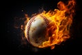 Flaming baseball in the darkness A fiery spectacle against a black backdrop