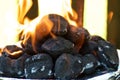 Flaming BBQ briquettes at eye level Royalty Free Stock Photo