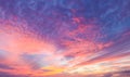 Flaming beautiful sunset background or replacement sky with pinks and organges and yellow and purple Royalty Free Stock Photo