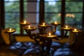 The flaming candles on a candlestick. Close up Royalty Free Stock Photo