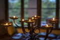 The flaming candles on a candlestick. Close up Royalty Free Stock Photo