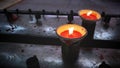 Flaming Candles Floating Inside the Ceramic Bowls
