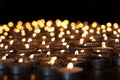 Flaming candles. Spiritual image of tealights providing sacred l Royalty Free Stock Photo