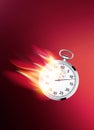 Flaming clock. Faster business concept.