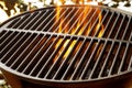 Flaming coals in a portable summer barbecue Royalty Free Stock Photo