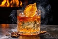flaming cocktail with ice cubes and citrus zest Royalty Free Stock Photo