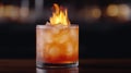 Flaming cocktail with ice cubes Royalty Free Stock Photo