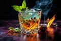 flaming cocktail with ice cubes and mint leaves Royalty Free Stock Photo