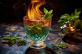 flaming cocktail with ice cubes and mint leaves Royalty Free Stock Photo