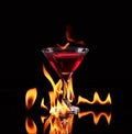 Flaming cocktail over black Royalty Free Stock Photo