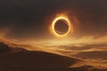 A total solar eclipse highlighted by glowing sun rays, over a dark background. Royalty Free Stock Photo