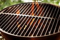 Flaming fire in a portable summer barbecue Royalty Free Stock Photo