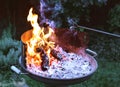 Flaming grill with open fire, ready for product placement. Royalty Free Stock Photo