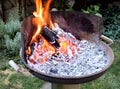 Flaming grill with open fire, ready for product placement. Royalty Free Stock Photo
