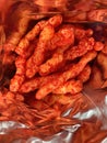 Flaming Hot Crunchy Cheese Puffs Snack Royalty Free Stock Photo