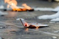 flaming paper plane about to land on a nonflammable surface Royalty Free Stock Photo