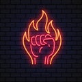 Flaming red fiery fist emblem Neon Sign. Symbol strength, power vector illustration