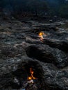 Flaming rock Yanartas, Chimera fires in eveninng, Antalya, Turkey