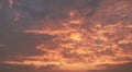 Flaming sky with orange clouds at sunset Royalty Free Stock Photo