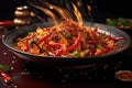 flaming wok with red-hot chili peppers and spices