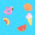 Flamingo, rainbow, watermelon, ice cream cone, seashell pool floats on blue water