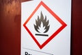 Flammable sign on the wall of a workshop.. Royalty Free Stock Photo