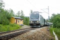 Flamsbana railway train arriving at small rural station, Norway. Royalty Free Stock Photo