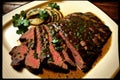 flank steak, marinated in flavorful sauce and grilled to perfection Royalty Free Stock Photo